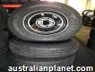Black Sunraysia rims with light truck tyres